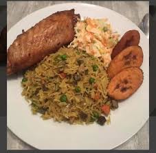 Ghana Coconut Rice, salad, plantain, and Turkey